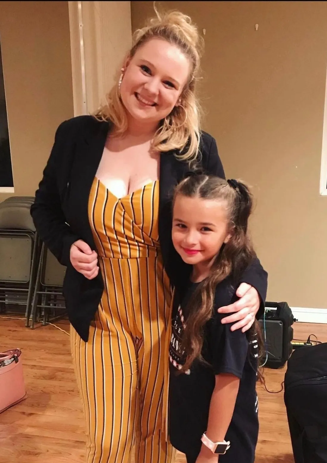 Riley Mackie with a young student