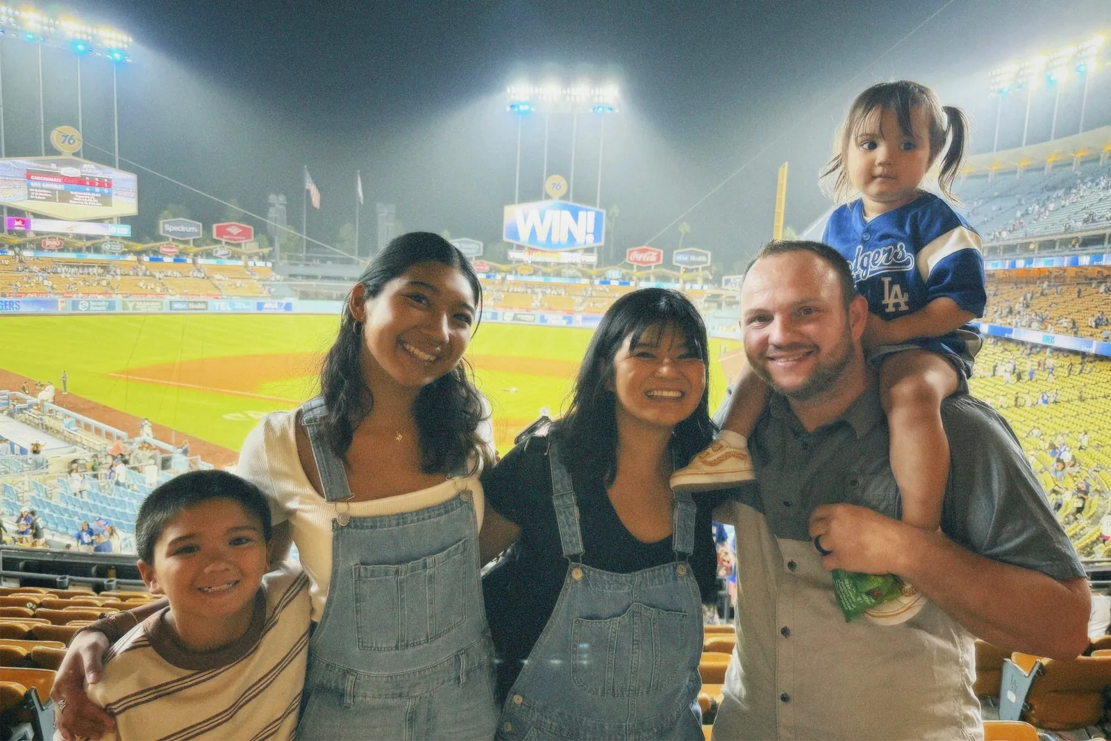 RJ and Arselene Hemenway with their children at Dodger Stadium